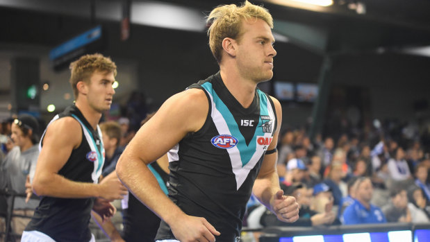 Former top draft pick Jack Watts (right) finished his AFL career with the Power after 152 games with the Demons. 