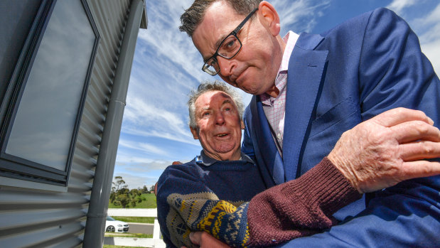 Daniel Andrews with Bob Grubb, whose grandson Anthony died when he was hit by a train.