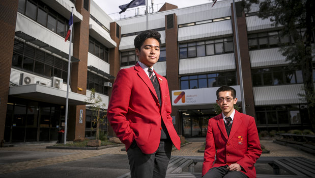 Vietnamese international student An Hoang (left) and Chinese student Jian Kun Zheng say Auburn High School has given them plenty of opportunities