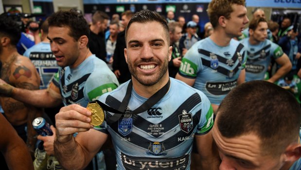  James Tedesco proudly displays the Wally Lewis Medal after the Origin series.