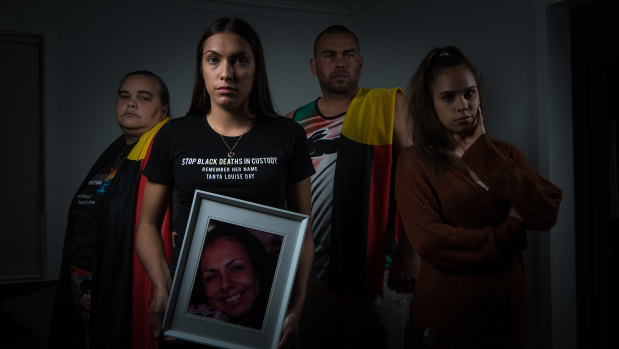 Tanya Day's children: (L-R) Belinda Stevens, Apryl Watson (with pic of Tanya), Warren Stevens and Kimberly Watson.