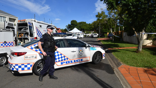 Police kept a tight cordon around a section of Delfin Drive as they gathered evidence.