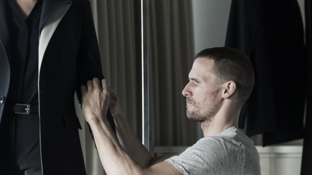 Fashion designer Dion Lee during a fitting of his new uniform for Sydney Opera House staff.