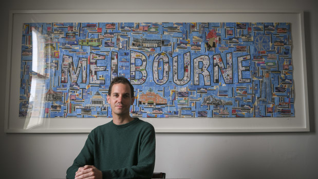 Josh Cohen with his artwork made from Metcards, which came fourth in the Signature of M art prize.
