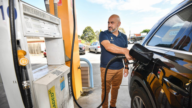 Sabby Soodan, co-founder of Refueler, fills up at SE Fuel in Mount Waverly.   