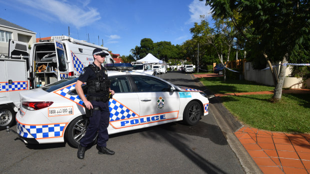 Forensic officers and detectives swarmed the crime scene on Tuesday.