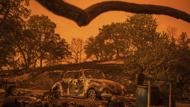 A Volkswagen Beetle scorched by the Carr Fire rests at a residence in Redding, California.