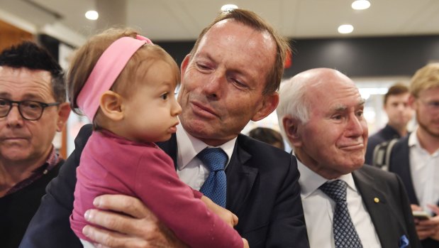 John Howard campaigns alongside Tony Abbott in Sydney on Monday.
