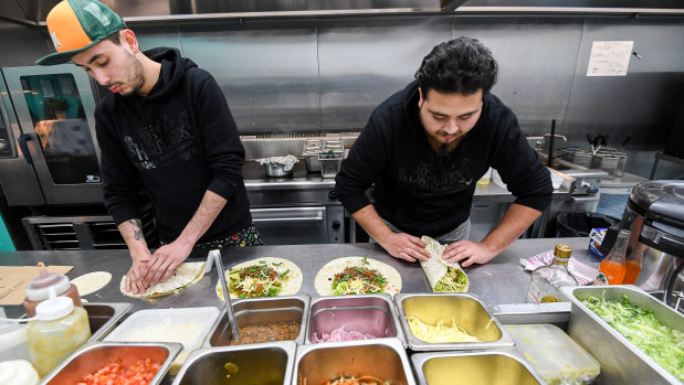 Chefs at work inside Deliveroo's dark kitchen in Windsor. 