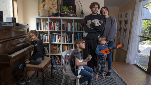 Bec Secomb and newborn daughter Lulu Margaret with husband Josh and children Archer Bailey, 8, Jack Wilde, 6, and Cohen Cash, 3, at their Bilgola Heights home.