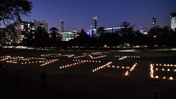 'I can't breathe' spelt out in candles at Musgrave Park.