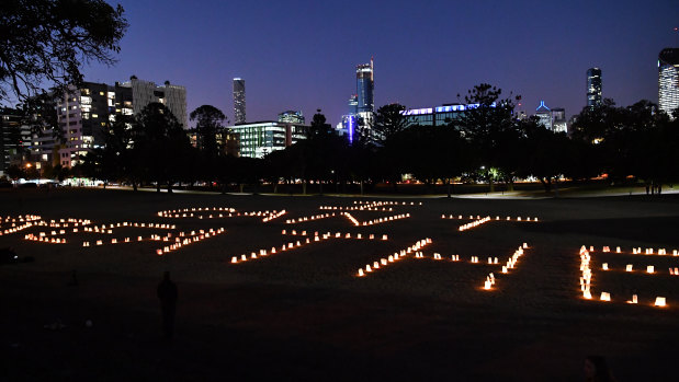 'I can't breathe' spelt out in candles at Musgrave Park.