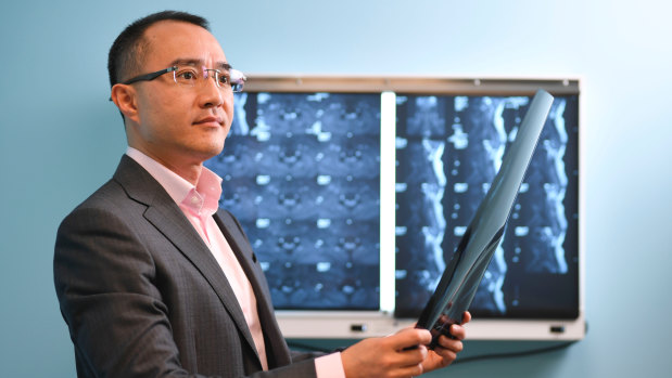 Dr Michael Wong educates patients about solutions to long-term spinal pain.