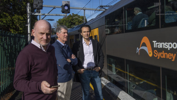 Local residents Brian McGlynn, left, Ian Links and Stefano Palomba at Wollstonecraft station.