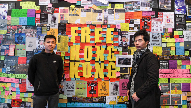A poster wall covered in messages supporting democracy in Hong Kong at the University of Technology, Sydney.