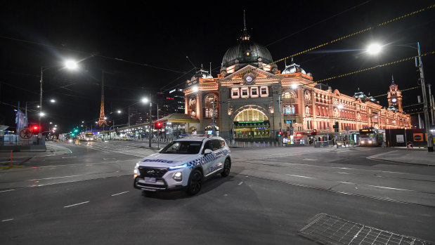 Flinders Street Station just after the curfew came into force at 8pm on Sunday.