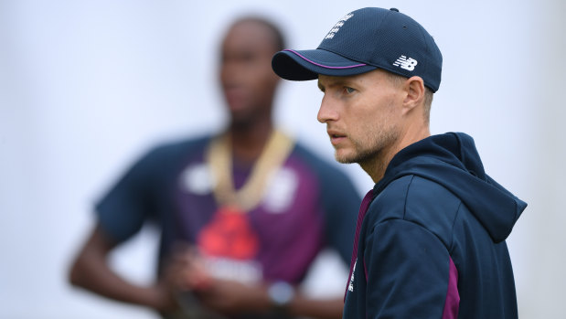 Guided missile: Joe Root looks on as Jofra Archer prepares to bowl in the nets at Old Trafford. How Roots bowls Archer will go a long way to deciding the outcome of the fourth Test.
