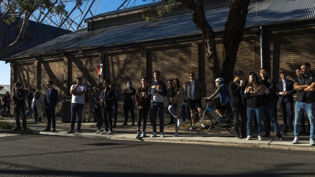 The auction crowd at 362 Wilson St, Darlington, opposite Carriageworks.