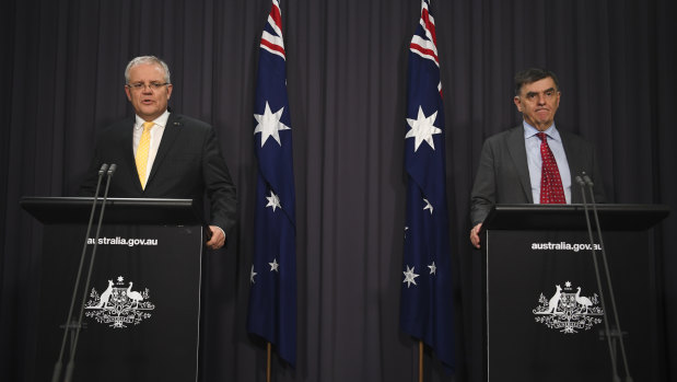 Prime Minister Scott Morrison and Chief Medical Officer Brendan Murphy speak to the media on Tuesday night