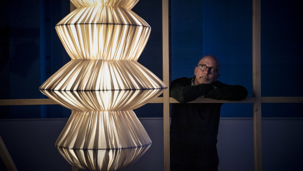 Hybrid's creative director Stephen Todd, with the HAVA pendant light and purifier.