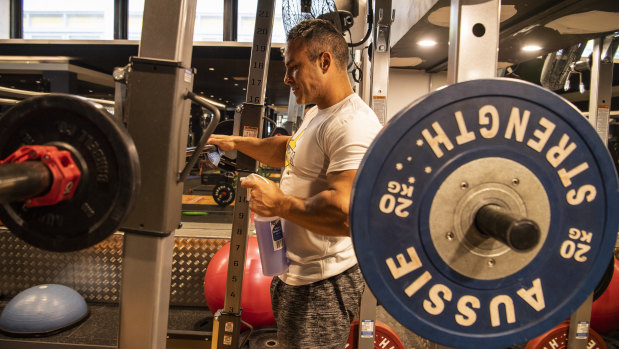 Marcelo Alexander cleaning equipment at City Gym.