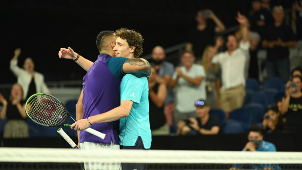 Nick Kyrgios and Ugo Humbert embrace.