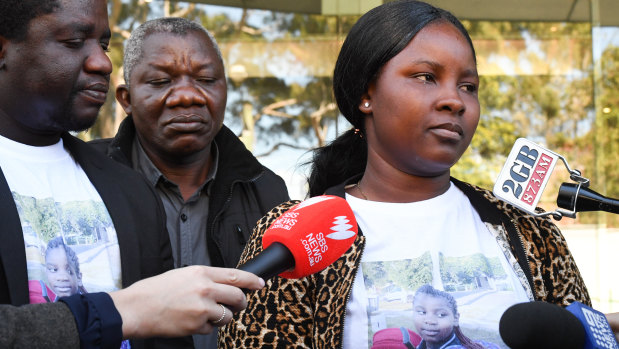 Mary Kpaba told the coronial inquest how she had run back into the burning home to save her daughter. 
