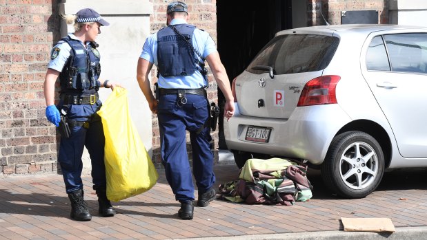 A car mounted the kerb in the Redfern collision, injuring two pedestrians.