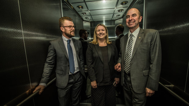 The Human Services Department is helping veterans into jobs after they leave the defence force, recruiting them to its cyber defence team protecting Australia's welfare system.  From left, new recruit James Line, chief information security officer Narelle Devine, and acting chief information officer Charles McHardie.