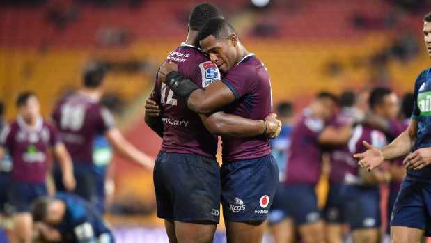 Samu Kerevi embraces Filipo Daugunu in an emotional farewell to Queensland Rugby and Suncorp Stadium last week. 