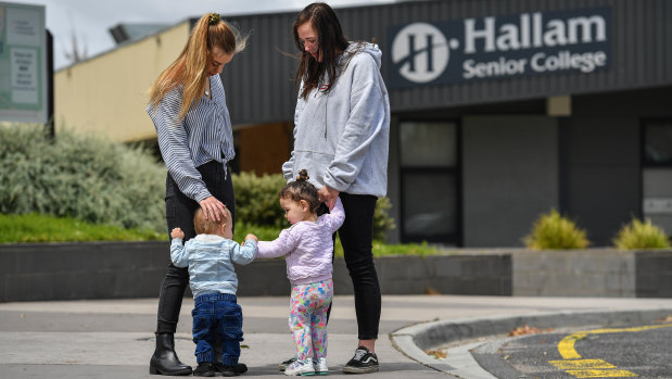 Breanna Cousens, with son Jaxon, and Angel Rees, with daughter Maali, at Hallam Senior Secondary College.
