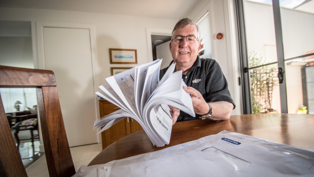 Belconnen resident John Steep, who received a parcel of hundreds of ActewAGL bills on Wednesday.