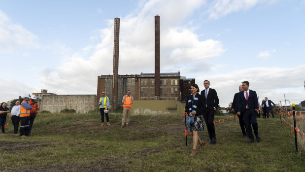 Premier Gladys Berejiklian, Treasurer Dominic Perrottet and Transport Minister Andrew Constance in front of the heritage-listed White Bay Power Station.