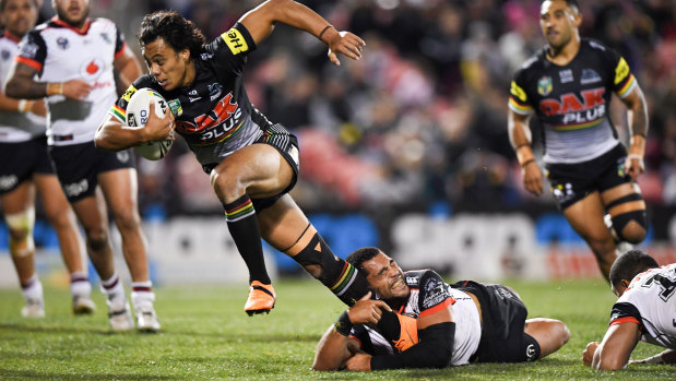 Slipping away: Jarome Luai breaks free during a happy night at the office.