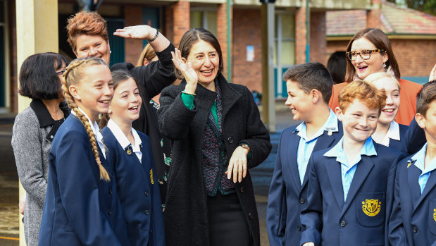 NSW Premier Gladys Berejiklian with students at Panania Public School on Monday.