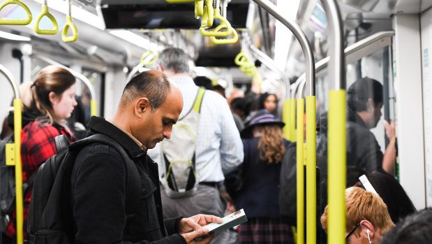 Commuters on a driverless metro train on Monday morning.