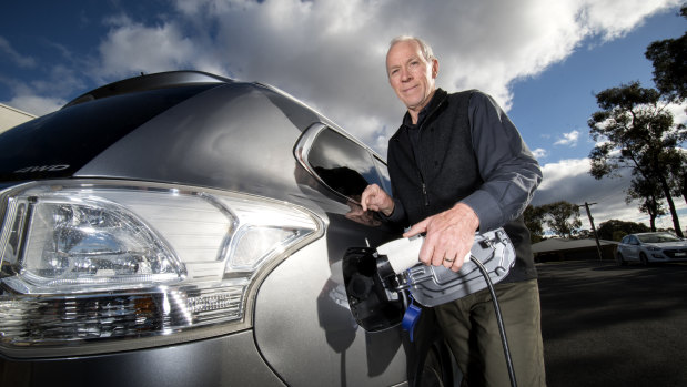 Paul Kirkpatrick  with his hybrid vehicle.