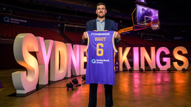 The King is here: Bogut poses with the second Sydney Kings jersey he has been presented with.