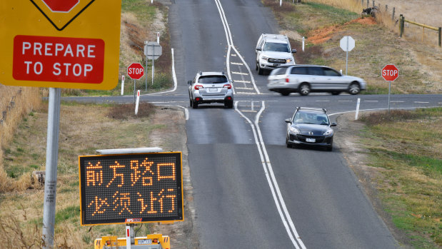 Problematic intersection. Chinese signage was erected earlier this year.