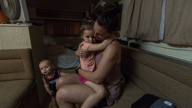 Sarah Beer with daughter Elsie and son Xavier holed up in the caravan.