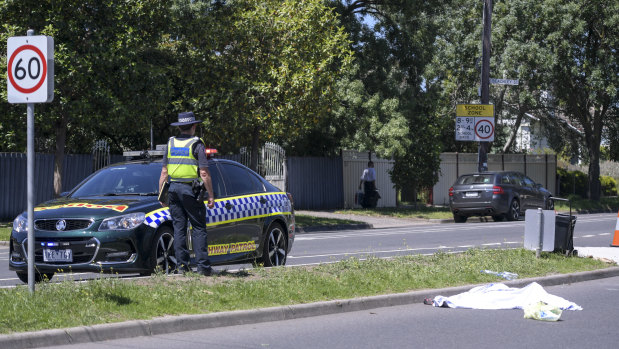 Police at the scene in Braybrook where an elderly woman was killed.