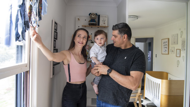 Danielle and Ray Rizk at home with their son George.