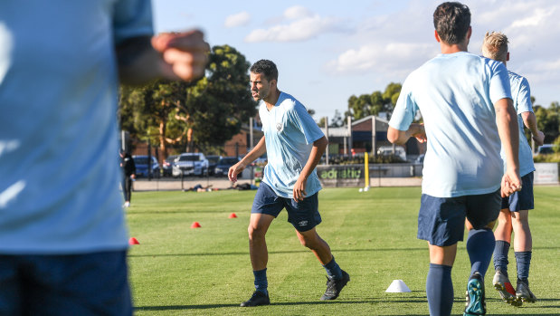 Araibi and his teammates at work for Pascoe Vale.