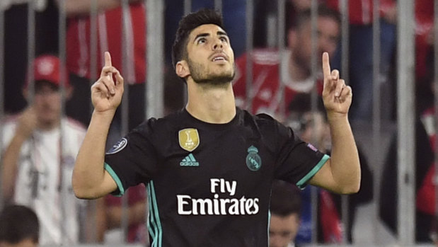 Taking the lead:  Marco Asensio celebrates after scoring.