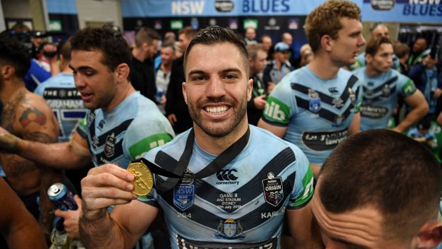  James Tedesco proudly displays the Wally Lewis Medal after the Origin series.