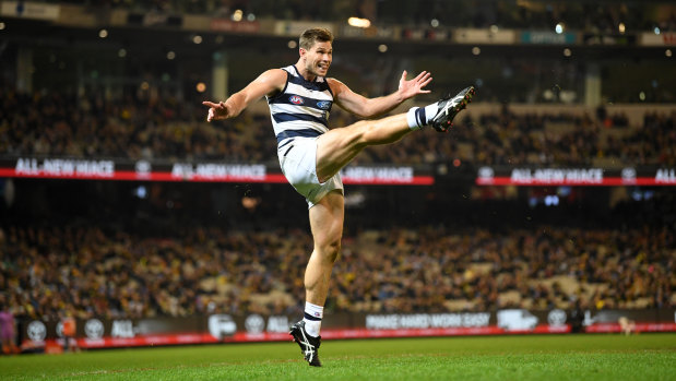 On point: Tom Hawkins kicked four goals for the Cats at the MCG on Friday night.