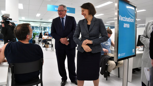 NSW Premier Gladys Berejiklian and NSW Health Minister Brad Hazzard during a tour of the NSW Vaccination Centre at Sydney Olympic Park as people in their 40s get their Pfizer shots. 