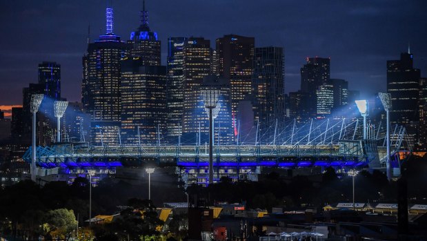 Buildings in Melbourne turned blue in a tribute to the four police officers who died on the Eastern Freeway a year ago. 