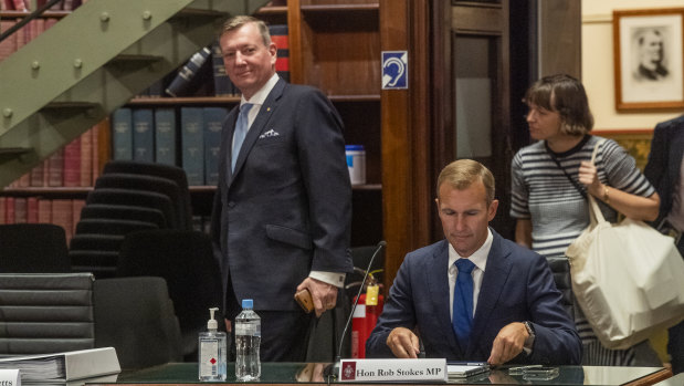 Landcom chief executive John Brogden, left, and Planning Minister Rob Stokes at the budget estimates hearing on Tuesday.