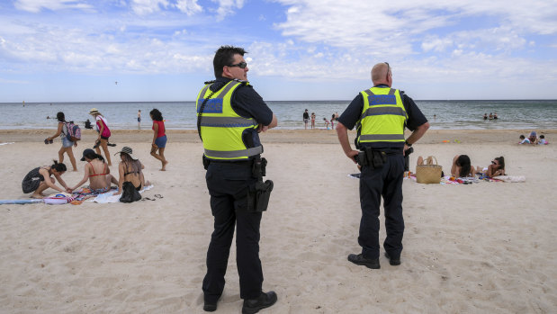 Police patrol Chelsea beach after the crime spree overnight. 
